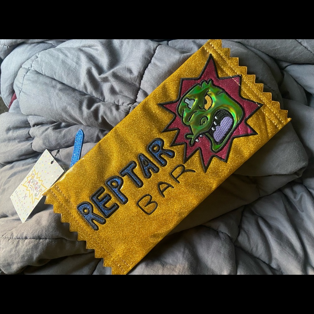 Rugrats Reptar Bar sparkly gold clutch